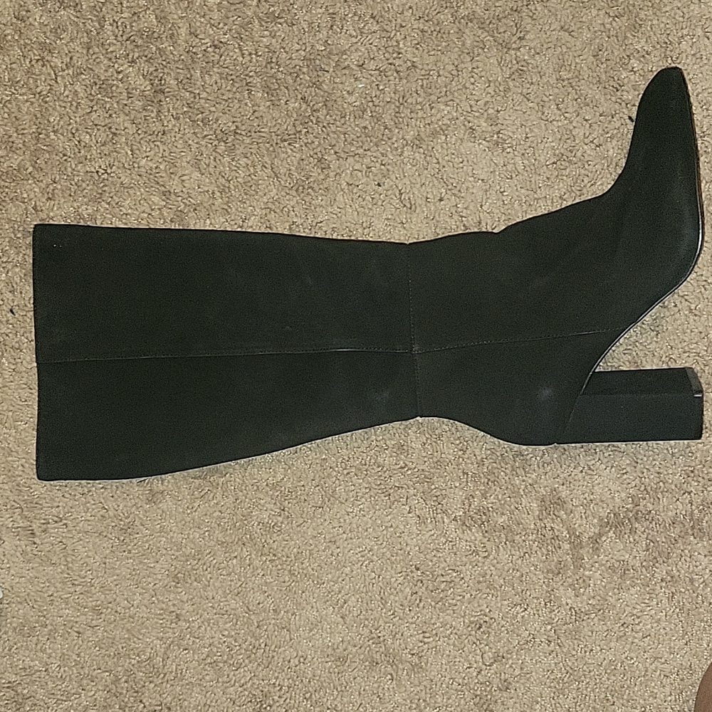 Tall black suede boots